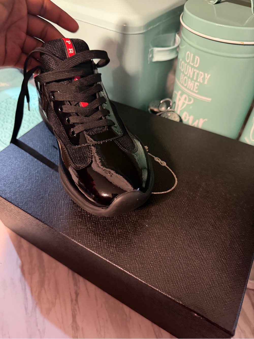 Prada Black Patent Low-Top Sneakers with Red Heel Tab - Picture 2 of 3